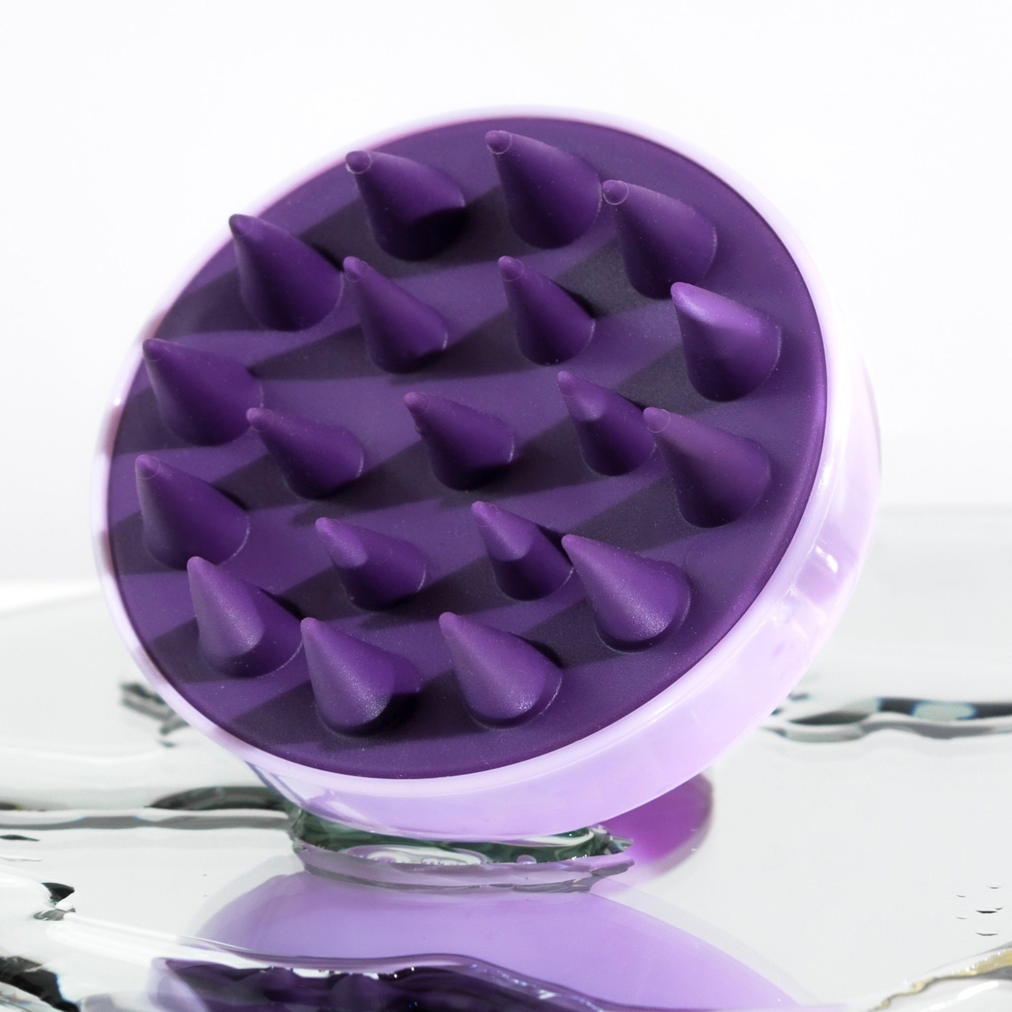 Scalp massager for blonde hair growth and hair repair.