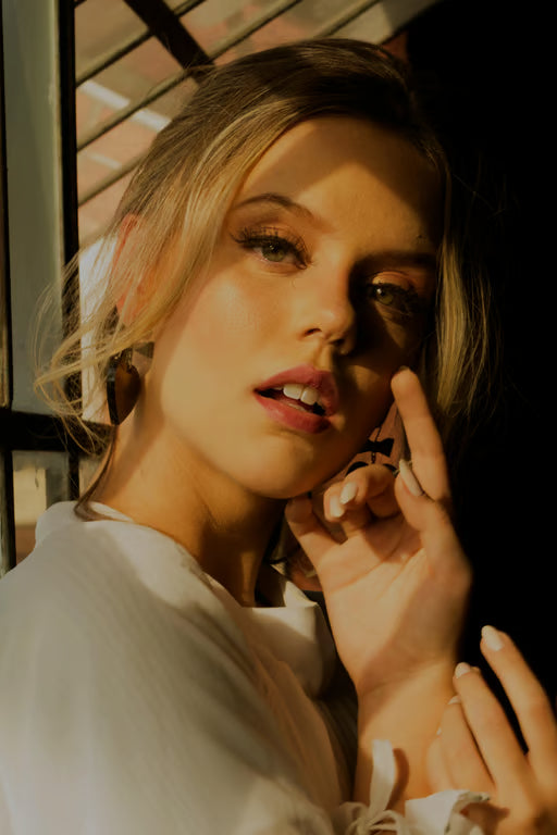 blonde-woman-nourishing-hair-oil